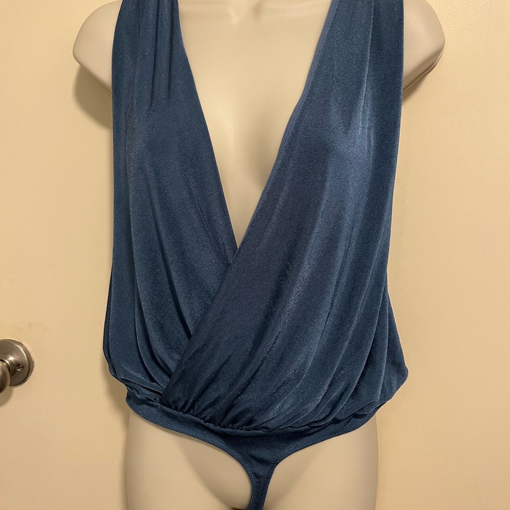 Free People new without tags Blue Sleeveless Bodysuit with Deep V-Neck
